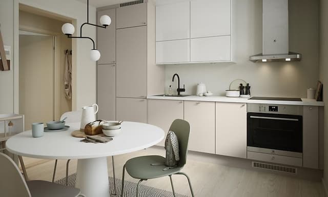 EPOQ Trend kök i vit och ljusbeige färg med öppen planlösning, vitt köksbord, och integrerad ugn med vit köksfläkt.