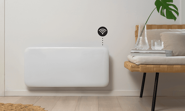 Smart heater on a wall with wifi symbol and interior in front