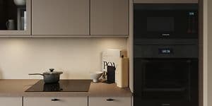 Epoq kicthen in sand with two black integrated ovens