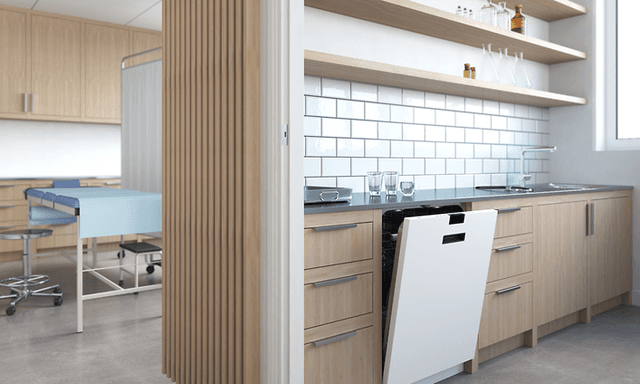 White dishwasher in a wooden kitchen