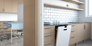 White dishwasher in a wooden kitchen