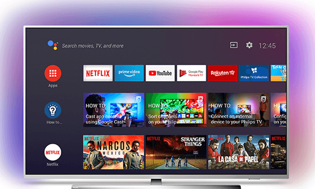 Smart-TV med ulike streamingtilbud på skjermen, lilla lys