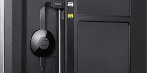 chromecast plugged in to the back of the TV