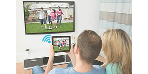 Couple using chromecast from a tablet