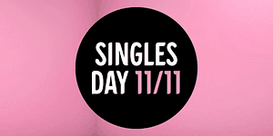 Sort cirkel med teksten Singles Day på lyserød baggrund