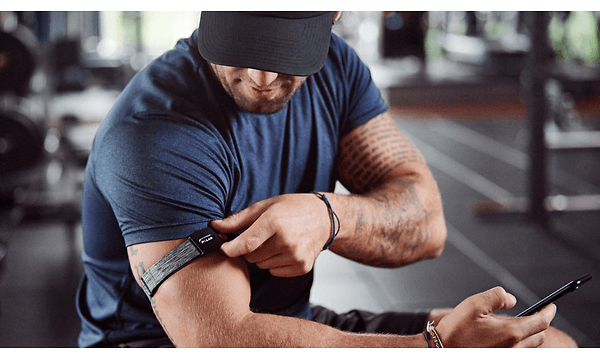 Polar - A Polar sensor on a man in a gym