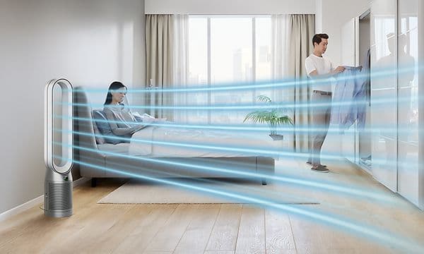 Dyson luftrenser på et soverom og illustrasjon av luftstrømmen som kommer ut av den