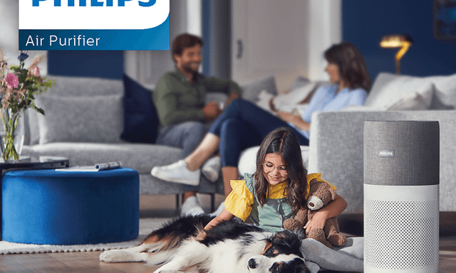 Philips luftrenser ved siden af barn og hund