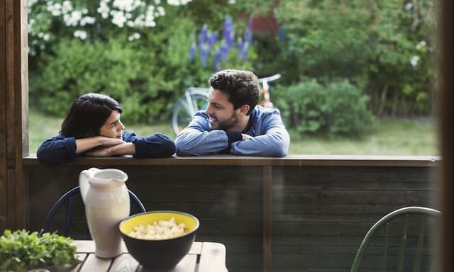 Cross category Summer - Couple outside with popcorn