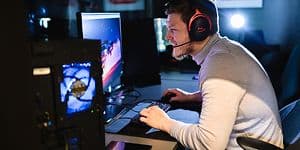 Man playing on a desktop gaming pc