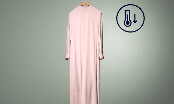 A pink dress hanging on a hanger