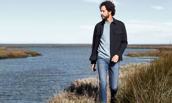 Man walking along a waterbed