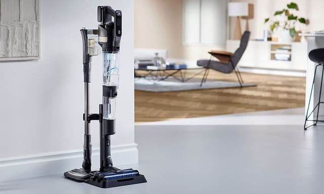 Philips AquaTrio vacuum attached to storage station