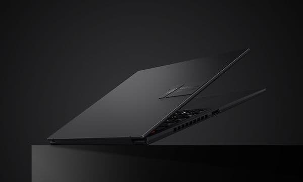 Vivobook S14 OLED - Black laptop slightly opened
