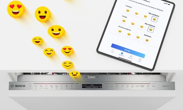 Oppvaskmaskin, et nettbrett og smilende emojier