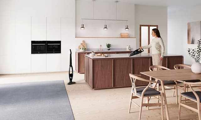  Stick vacuum cleaner from Electrolux in a livin g room