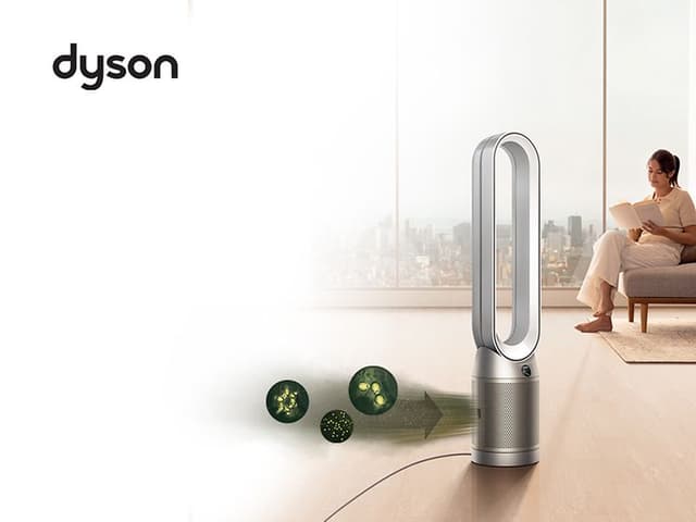 Dyson-ilmanpuhdistin ja nainen lukemassa taustalla
