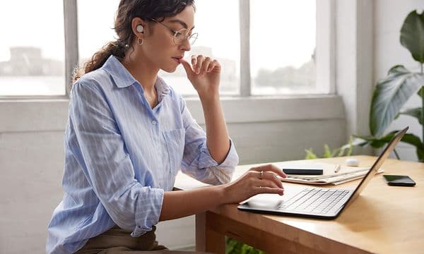 Woman with Pixel Buds working
