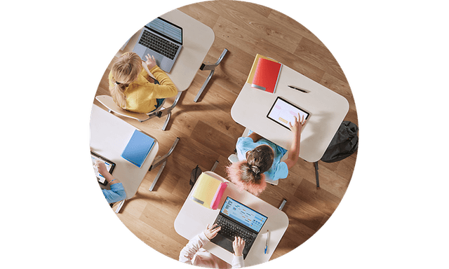 CS -Tablet and laptop insurance-Kids in a school using tablets and laptops