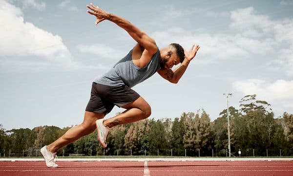 Man running with in-ears
