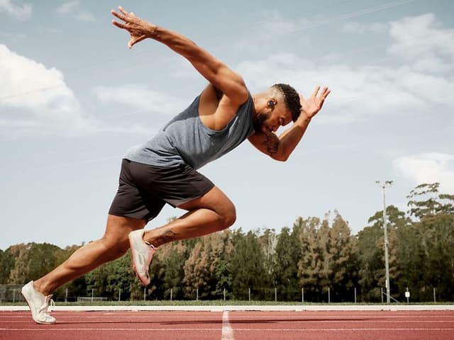 Man running with in-ears