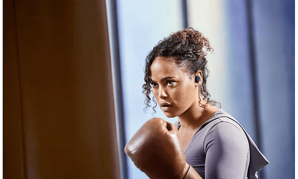 Woman boxing with in-ears