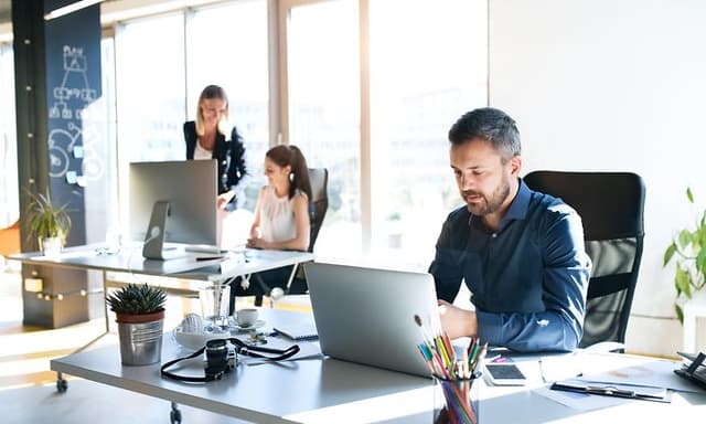 Three Colleagues Working Together