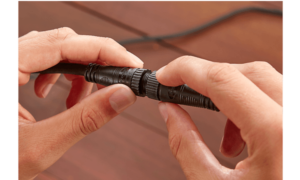 Hands adjusting cable