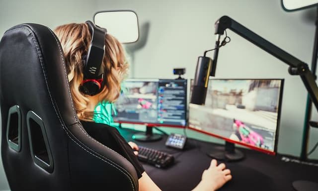 Gamer plays in gaming chair