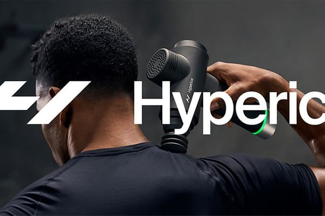 Man using a Hyperice Hypervolt massage gun and the Hyperice logo