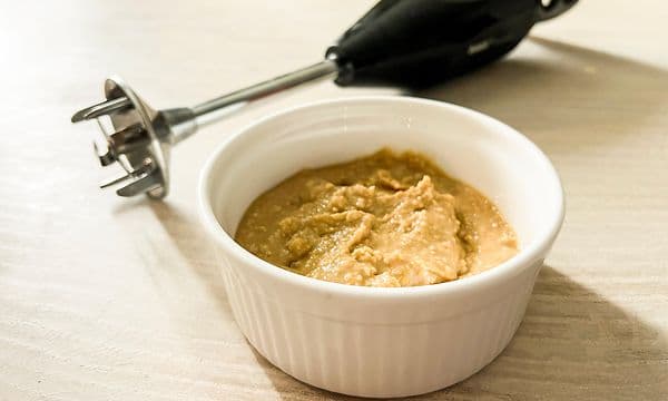 SDA - Blender - Peanut butter in a bowl next to a hand blender