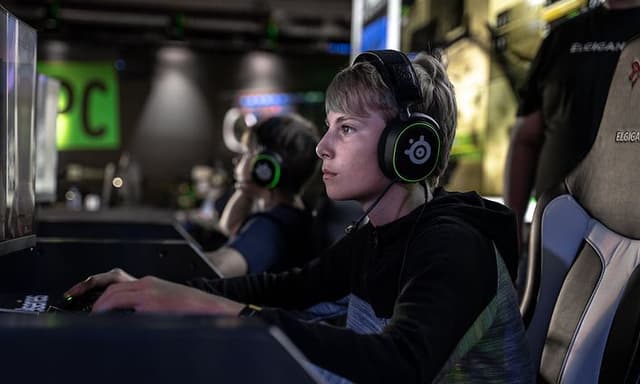 Boy in profile gaming