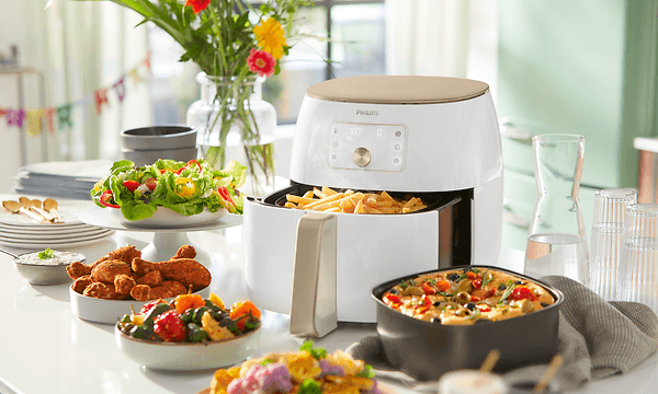 Hvit Philips Airfryer XXL og presentasjon av alle de forskjellige rettene man kan lage