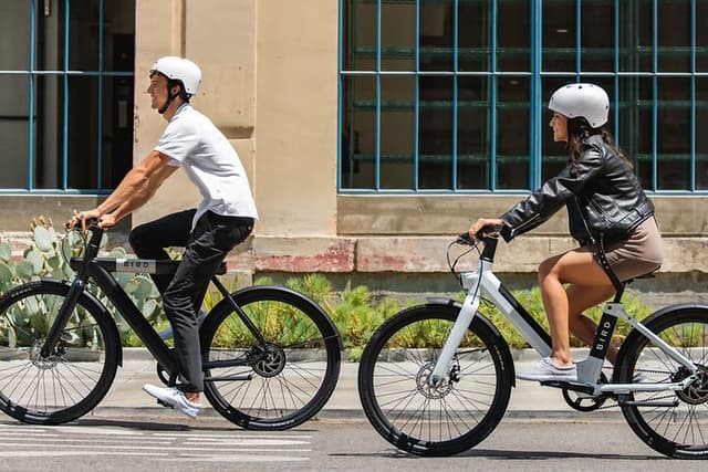 Two people on e-bike