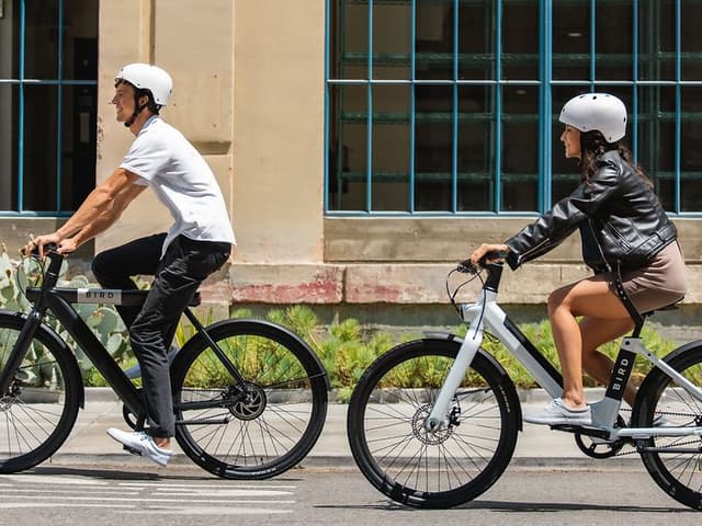 Two people on e-bike