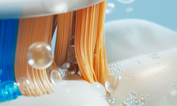 Philips Sonicare electric toothbrush brushing teeth