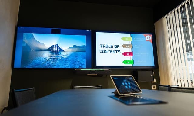 Meeting room with two screens