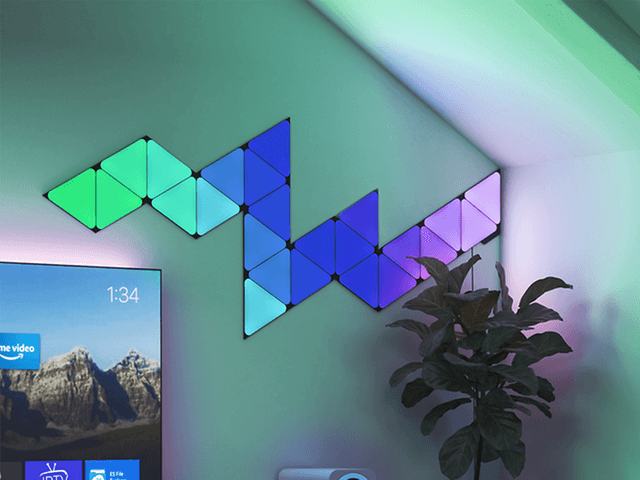 Nanoleaf Black Triangles smart light panels in a living room