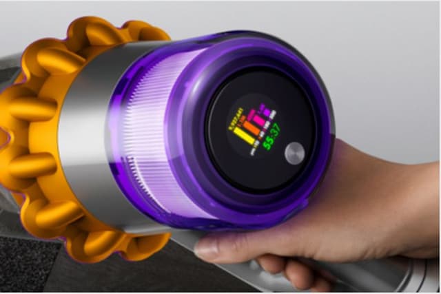 Nærbilde av Dyson vacuums LCD-skjerm med tre strømmoduser