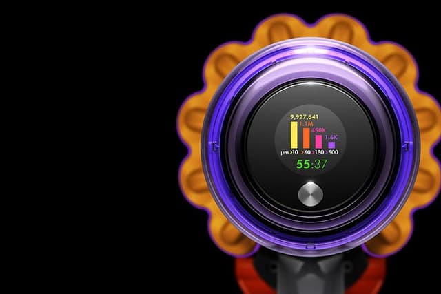 Dyson støvsugerens sin LCD-skjerm på svart bakgrunn
