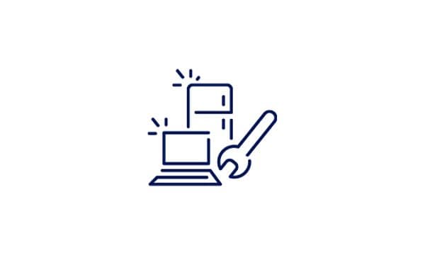 Illustration af en bærbar computer og køleskab ved siden af en stor skruenøgle