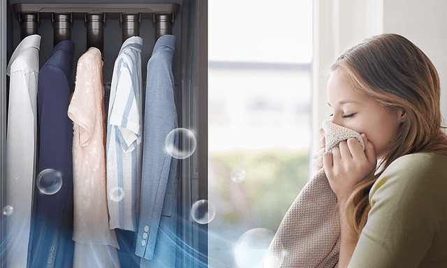 Kläder som hänger i Samsung AirDresser och en kvinna som luktar ren skjorta fräschas upp av AirDresser
