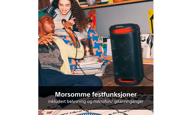 Young man and woman singing to a microphone that is connected to Sony XV500 speaker