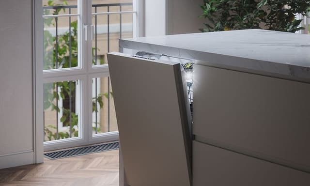 Integrated dishwasher with open door in modern kitchen island