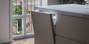 Integrated dishwasher with open door in modern kitchen island