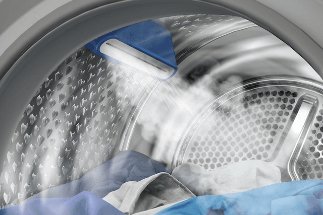 Bedst i test tørretumbler: Det indre af en tørretumbler med tøj indeni