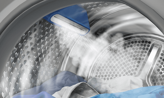 Bedst i test tørretumbler: Det indre af en tørretumbler med tøj indeni