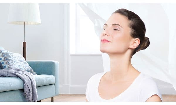 HEPA hygienic filter and woman enjoying fresh air