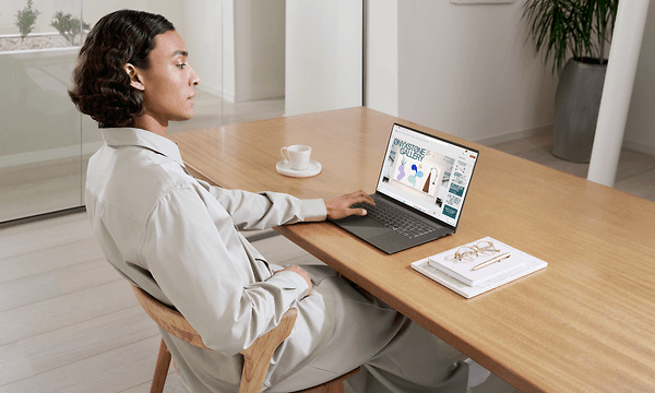 Person working with ASUS Zenbook S 16