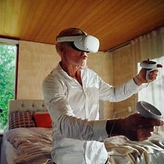 Man gaming with VR headset on